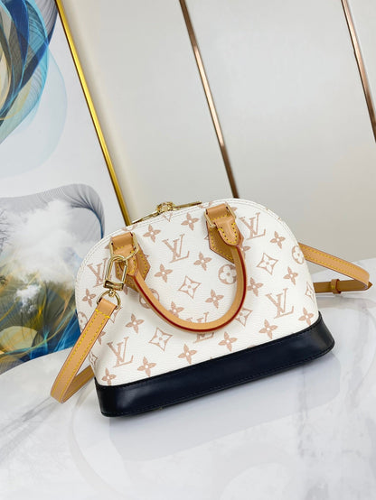 ALMA BB 25 EN TOILE DUNE MONOGRAMME BLANC QUINCAILLERIE DORÉ
