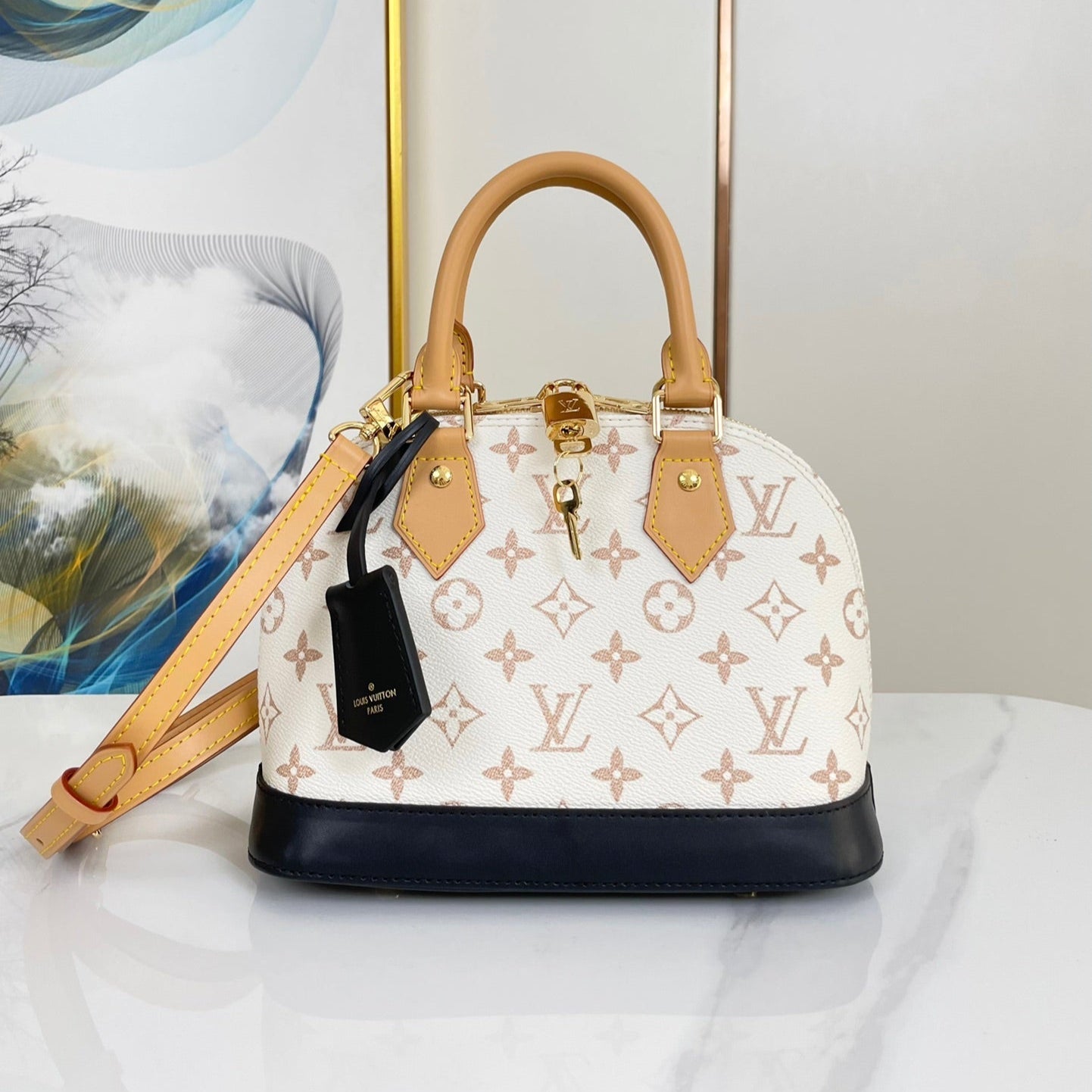 ALMA BB 25 EN TOILE DUNE MONOGRAMME BLANC QUINCAILLERIE DORÉ