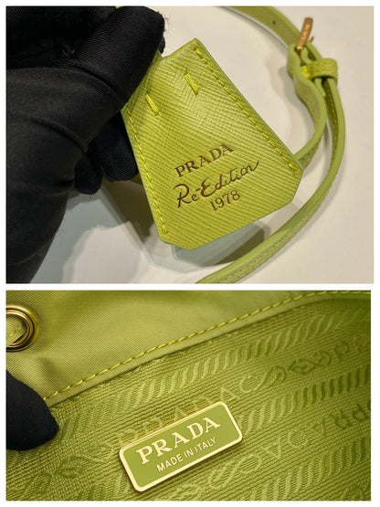 SAC SEAU 19 EN RE-NYLON VERT POMME ET POIGNÉE EN CUIR SAFFIANO