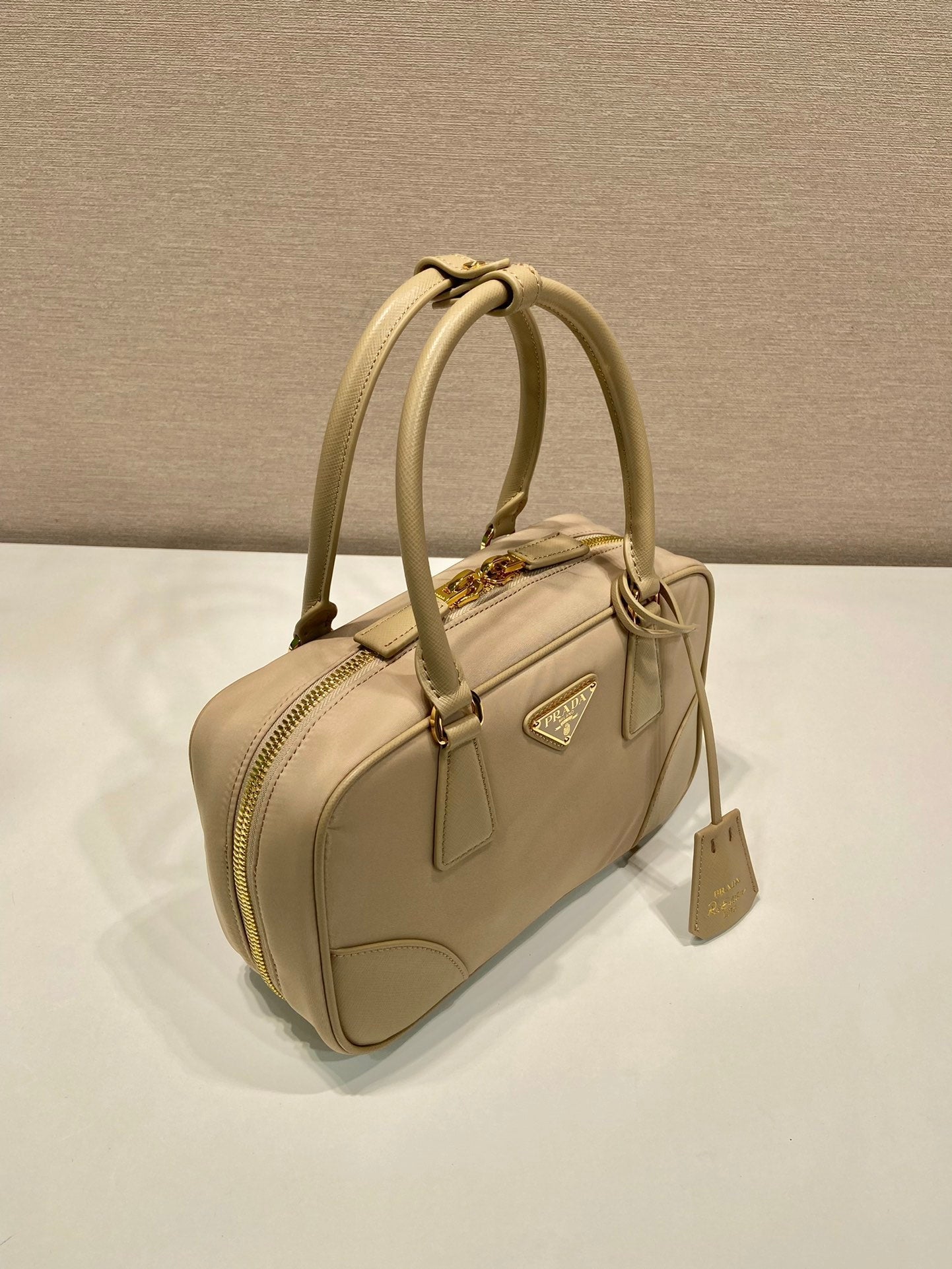 PETIT SAC À MAIN 25 EN NYLON MOUSSE SÉCHÉE ET GARNITURE EN CUIR DE VEAU