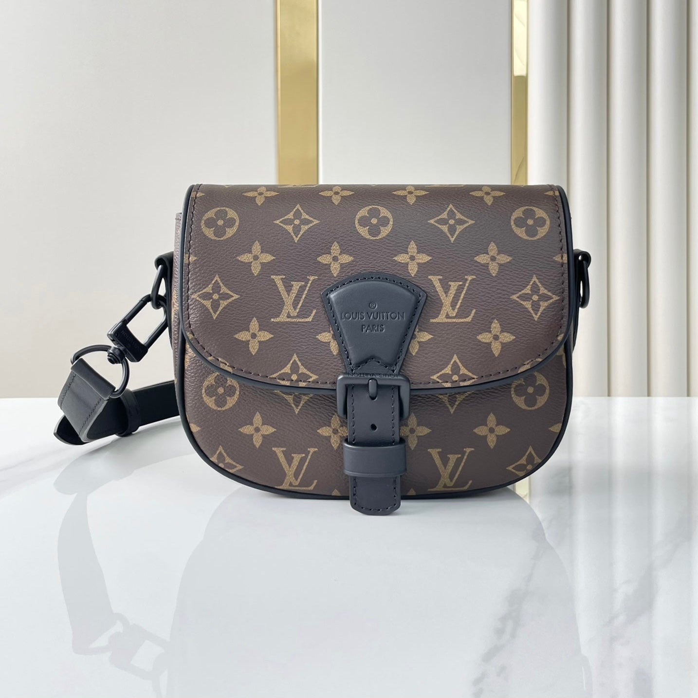 SAC MONTSOURIS MESSENGER PM 20 EN TOILE MONOGRAMME MARRON