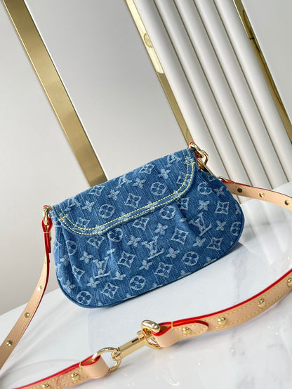 SUNSET 27 EN DENIM MONOGRAMME BLEU BOUCLE OR