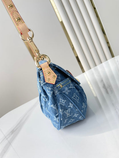 SUNSET 27 EN DENIM MONOGRAMME BLEU BOUCLE OR