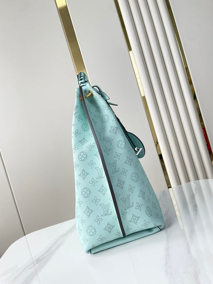 CARMEL 40 EN CUIR DE VEAU PERFORÉ MONOGRAMME BLEU CIEL