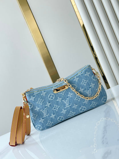 LIV POCHETTE 24 EN DENIM BLEU MONOGRAMME QUINCAILLERIE DORÉ