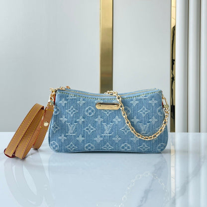 LIV POCHETTE 24 EN DENIM BLEU MONOGRAMME QUINCAILLERIE DORÉ