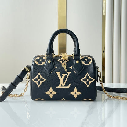 SAC BANDOULIÈRE SPEEDY 20 EN CUIR EMPREINTE MONOGRAMME NOIR CRÈME QUINCAILLERIE DORÉ