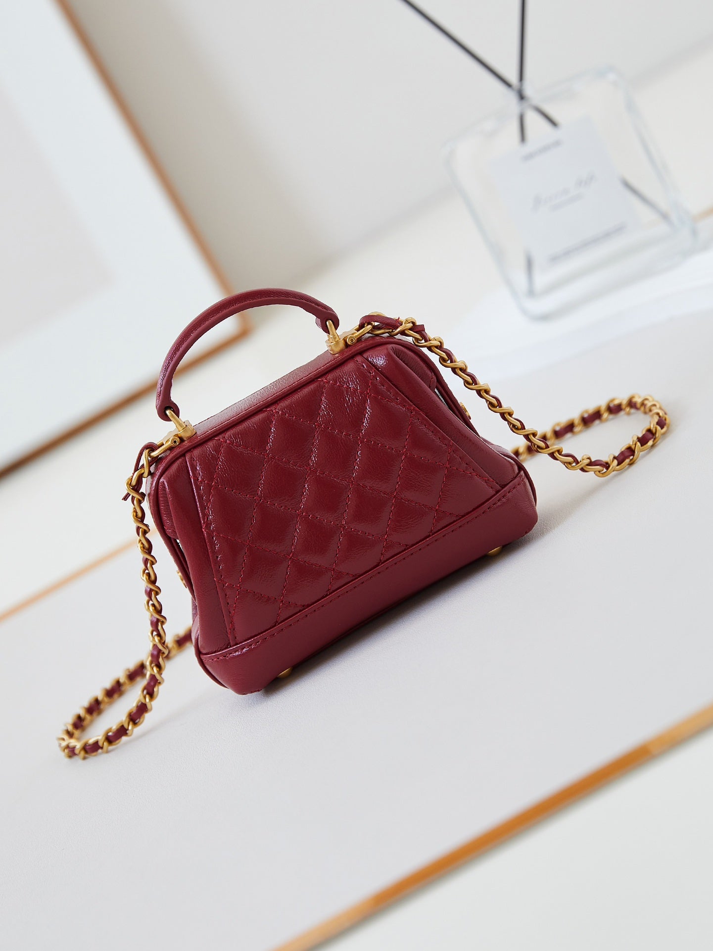 Mini poignée supérieure CC 24A 13 cm en cuir ciré rouge, accessoires dorés 238461