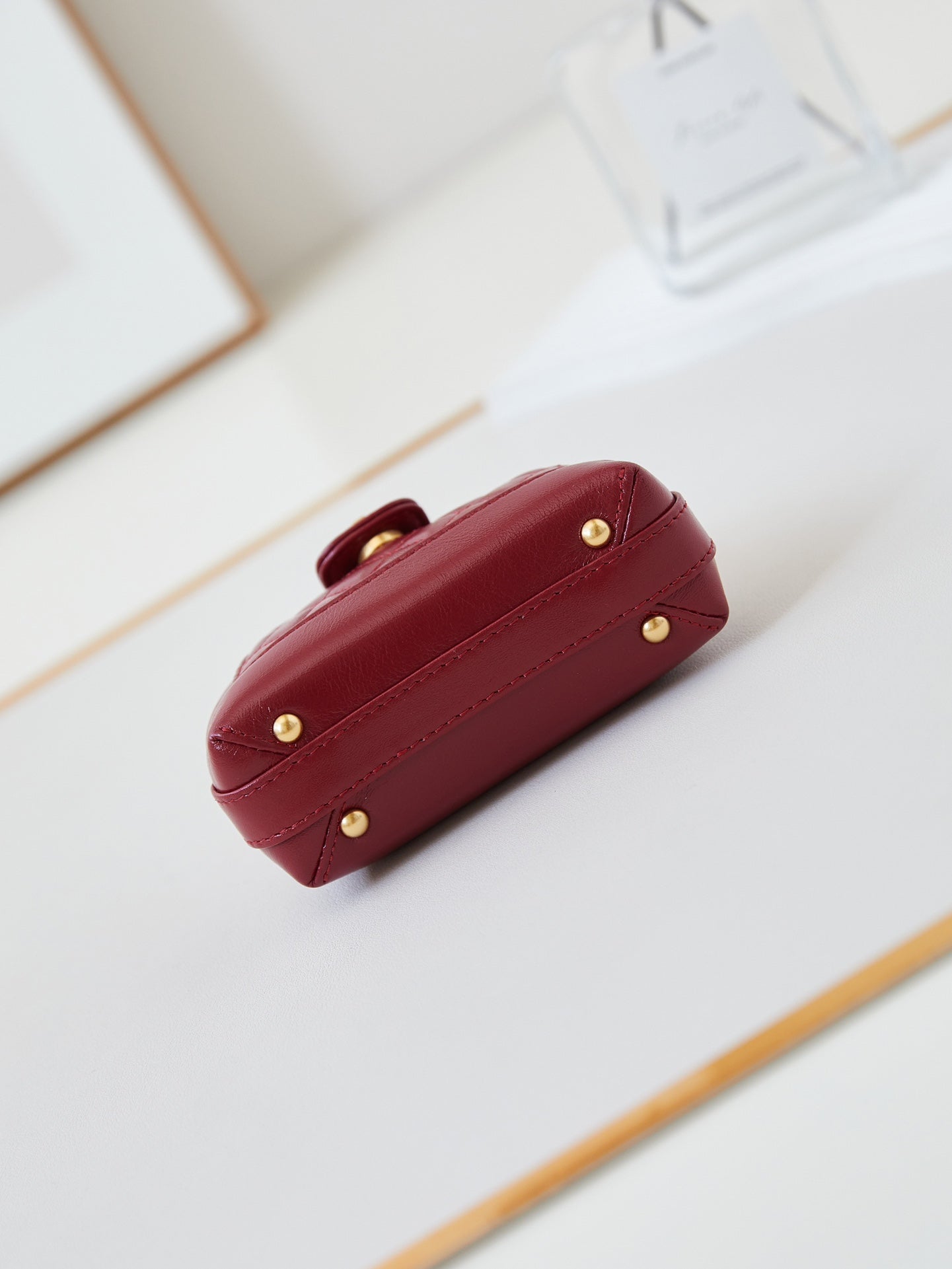 Mini poignée supérieure CC 24A 13 cm en cuir ciré rouge, accessoires dorés 238461