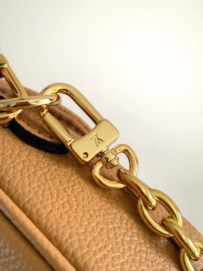 IVY 23 EN CUIR ARIZONA CRÈME MONOGRAMME EMPREINTE QUINCAILLERIE DORÉ