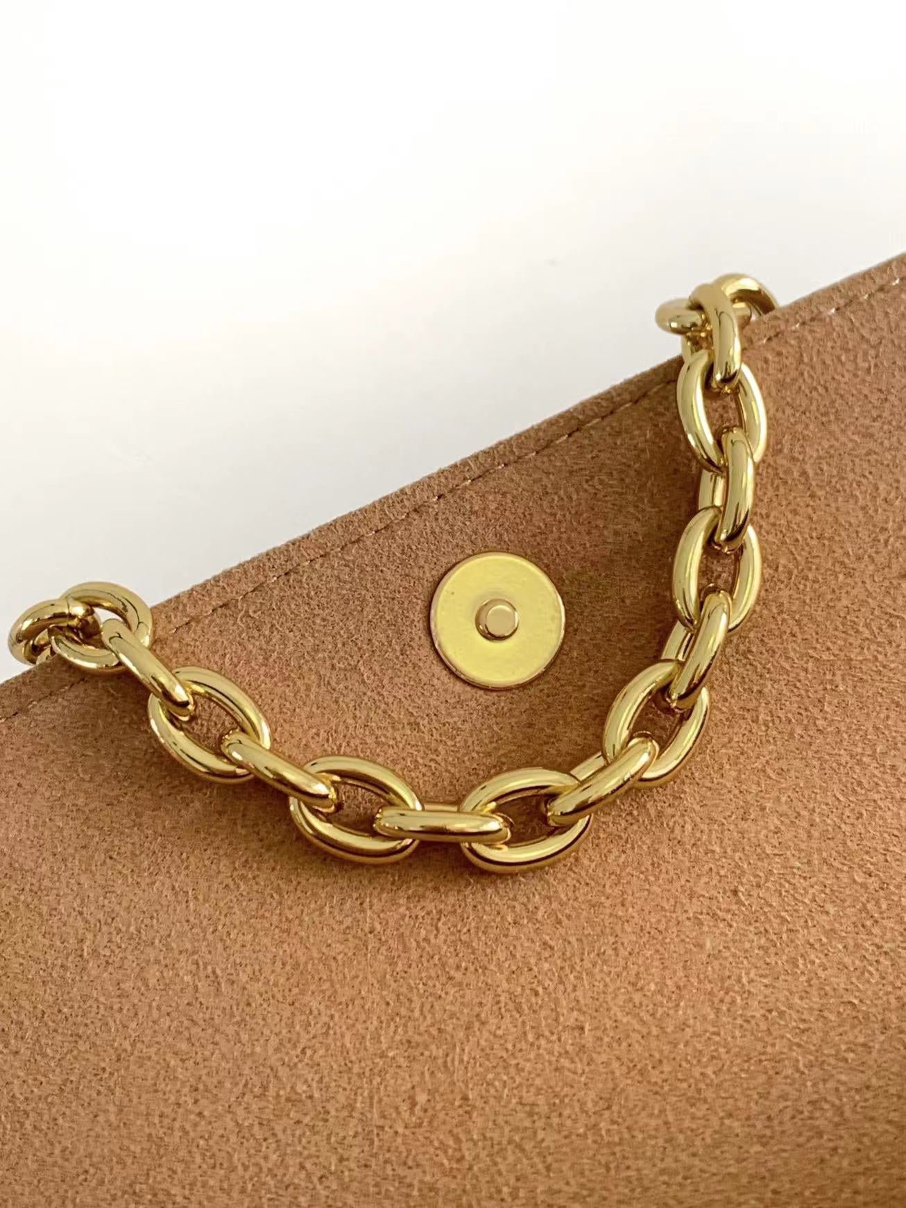 IVY 23 EN CUIR ARIZONA CRÈME MONOGRAMME EMPREINTE QUINCAILLERIE DORÉ