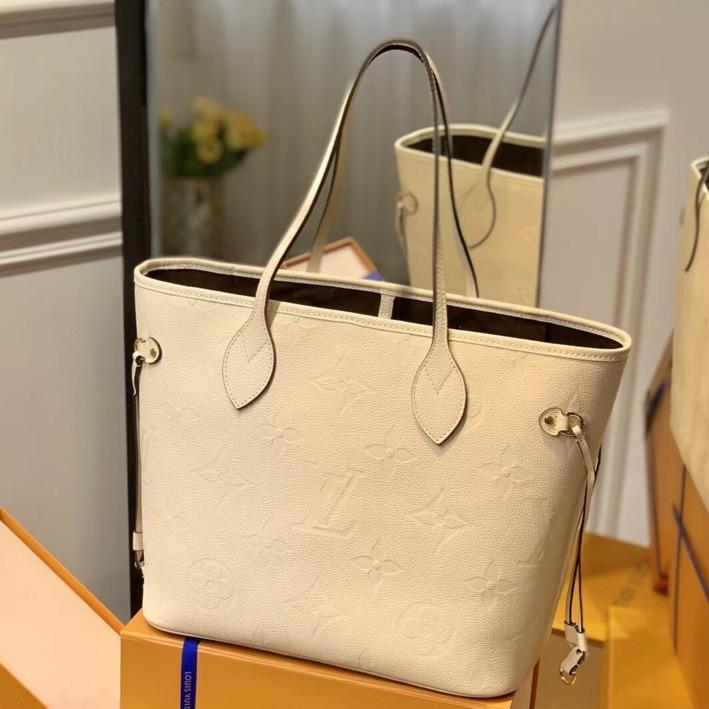 NEVERFULL MM 32 CUIR DE VACHE GAUFRÉ CRÈME 