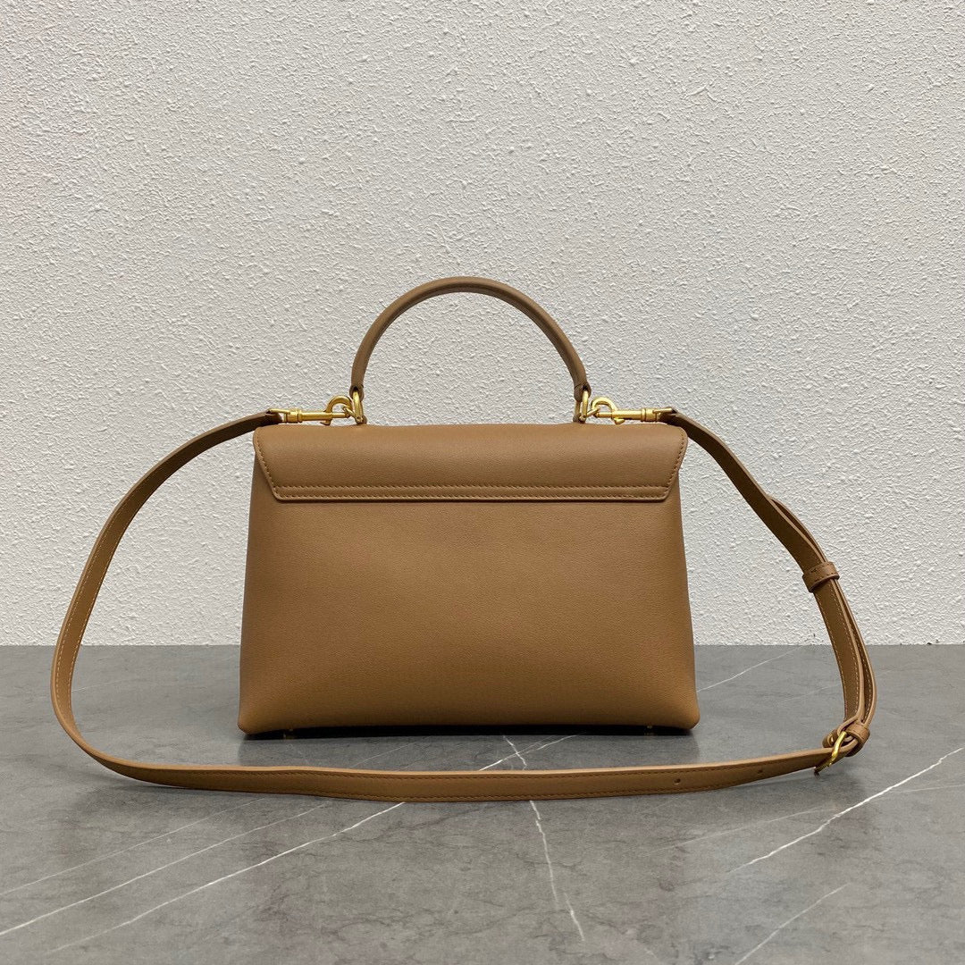 Celin Medium Nino 25 cm en cuir de veau marron avec finitions dorées