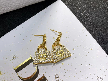 Boucles d'oreilles CD BAG en or et diamants