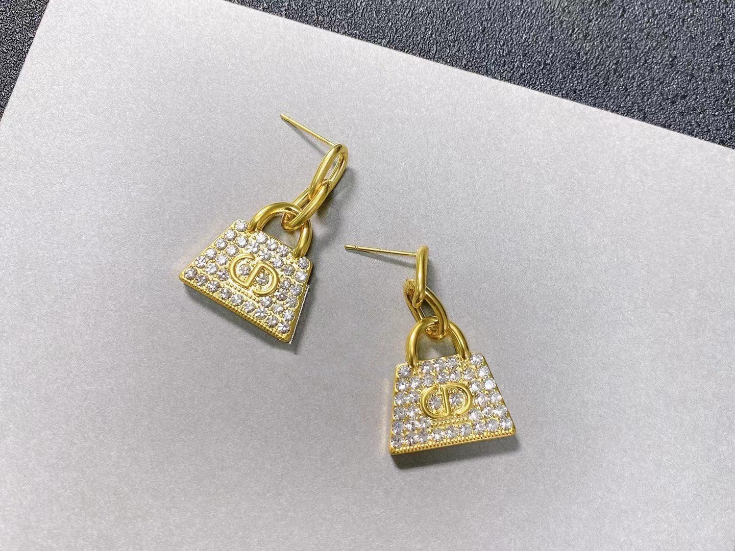 Boucles d'oreilles CD BAG en or et diamants