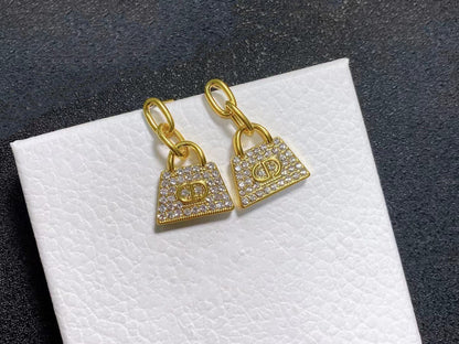 Boucles d'oreilles CD BAG en or et diamants