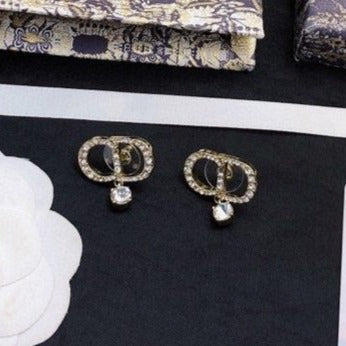 Boucles d'oreilles CD en or et diamants