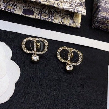 Boucles d'oreilles CD en or et diamants