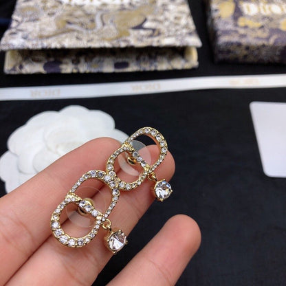 Boucles d'oreilles CD en or et diamants