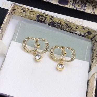 Boucles d'oreilles CD en or et diamants