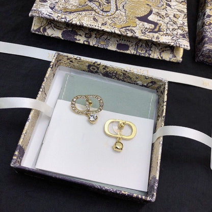 Boucles d'oreilles CD en or et diamants
