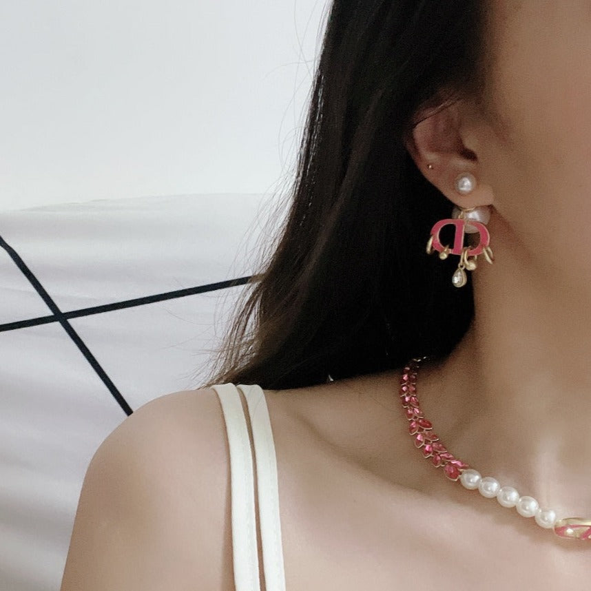 Boucles d'oreilles CD en or rose et perle avec 1 diamant