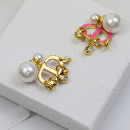 Boucles d'oreilles CD en or rose et perle avec 1 diamant