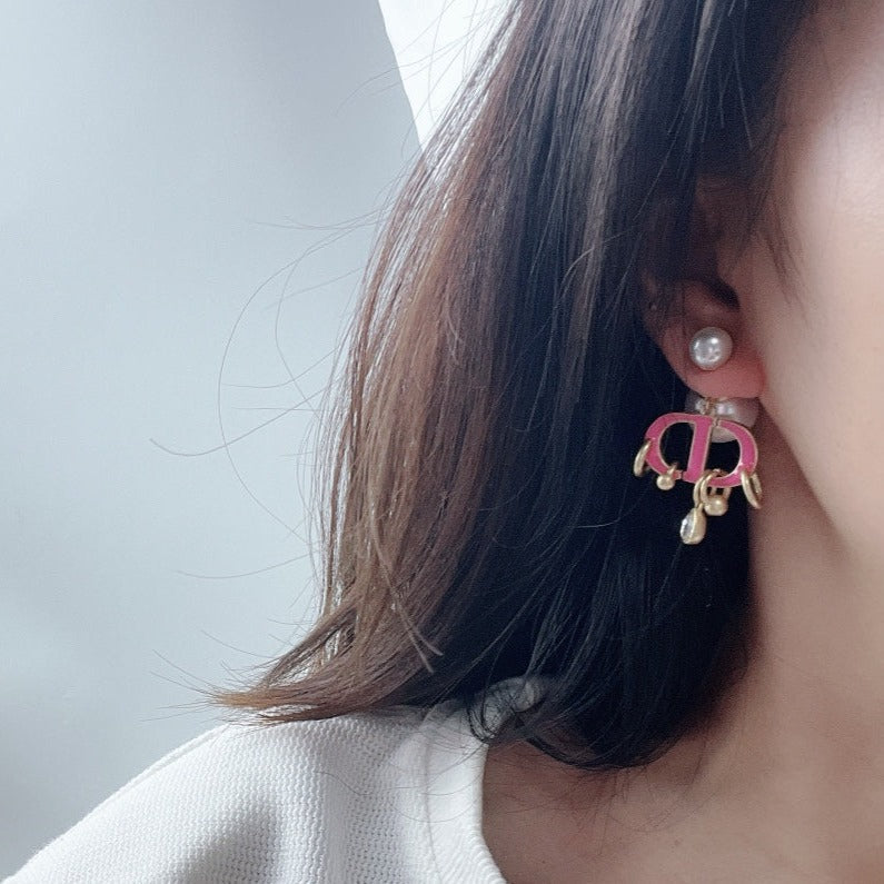 Boucles d'oreilles CD en or rose et perle avec 1 diamant