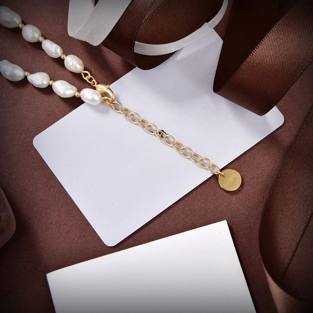 Collier CD en or et perles