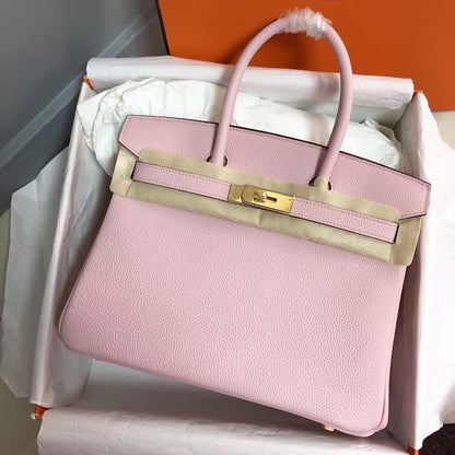 Sac HM Birkin 30 cm en cuir Togo rose et accessoires dorés