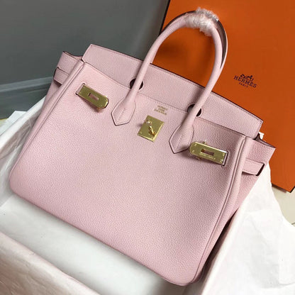 Sac HM Birkin 30 cm en cuir Togo rose et accessoires dorés