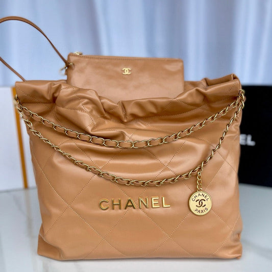 Sac hobo cc 22 en cuir de veau marron et accessoires dorés