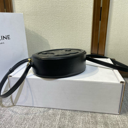 SAC OVALE 20 EN CUIR DE VEAU LISSE NOIR CANNELLE