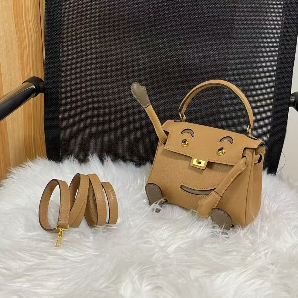 Poupée HM Kelly 16 cm en cuir Gulliver doré
