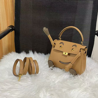 Poupée HM Kelly 16 cm en cuir Gulliver doré