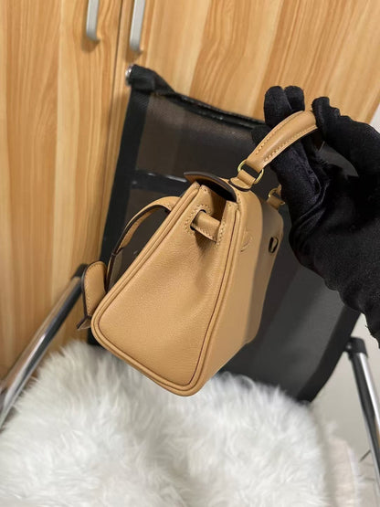 Poupée HM Kelly 16 cm en cuir Gulliver doré