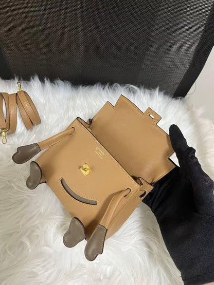 Poupée HM Kelly 16 cm en cuir Gulliver doré