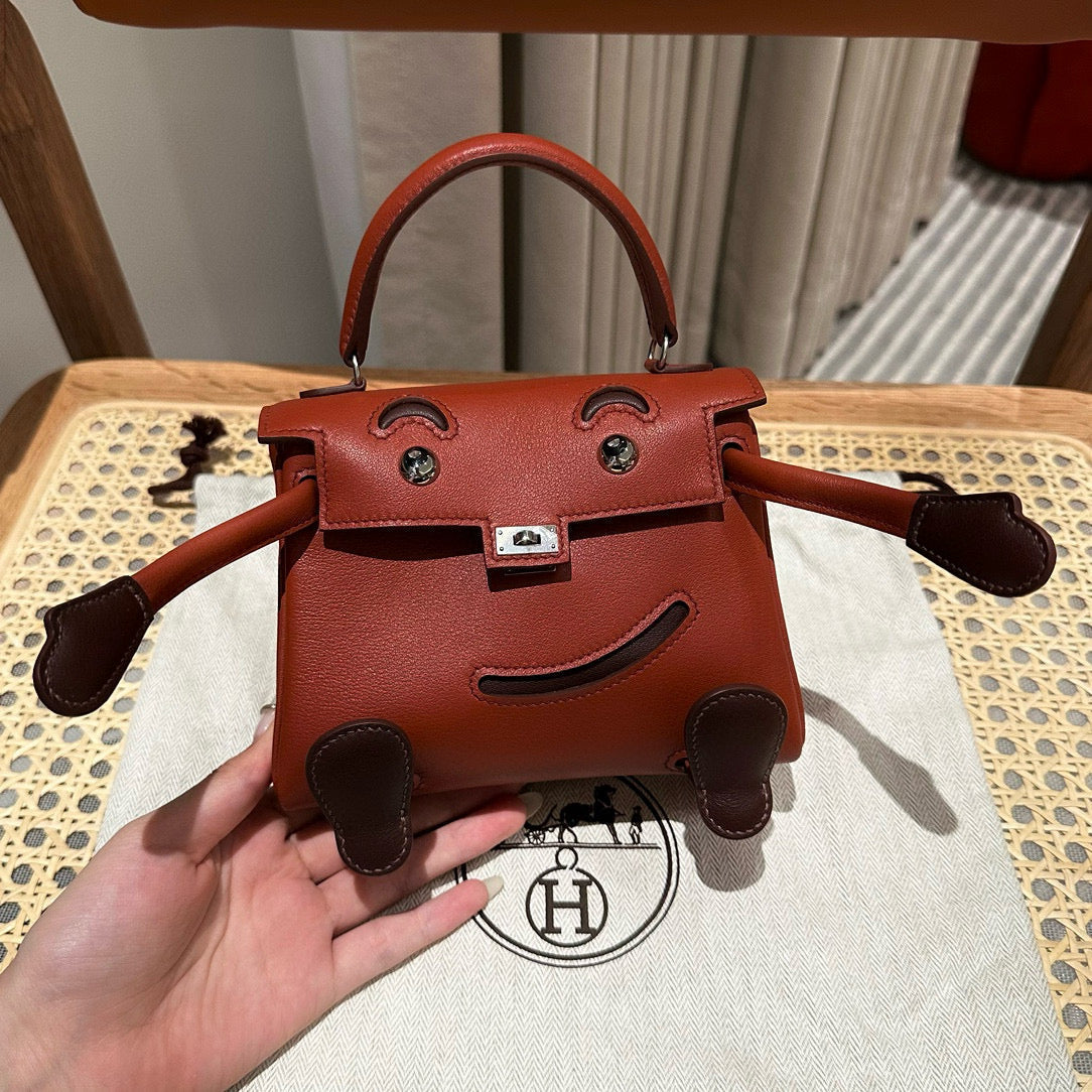Poupée HM Kelly 16 cm en cuir Gulliver bordeaux