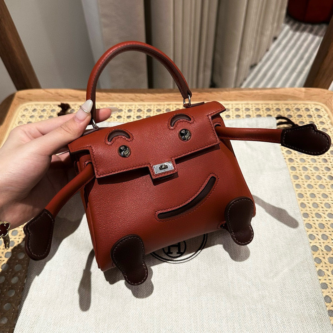 Poupée HM Kelly 16 cm en cuir Gulliver bordeaux