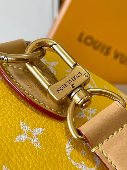 speedy p9 bandouliere 25cm yellow calfskin
