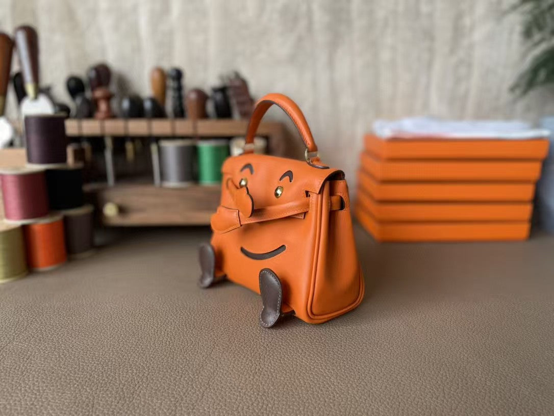 Poupée HM Kelly 16 cm en cuir Gulliver orange