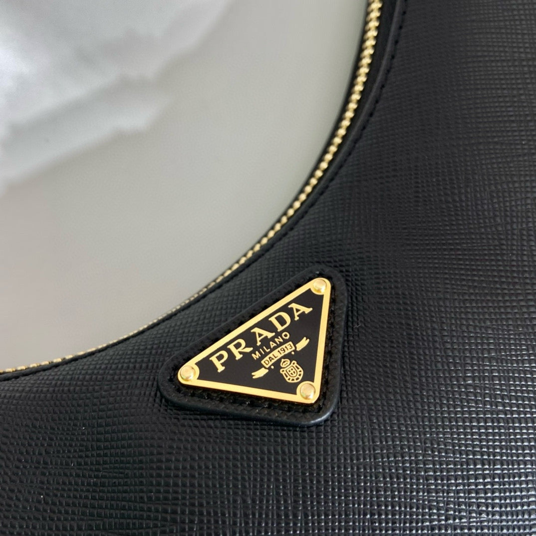 Mini sac en cuir Saffiano réédition Prada