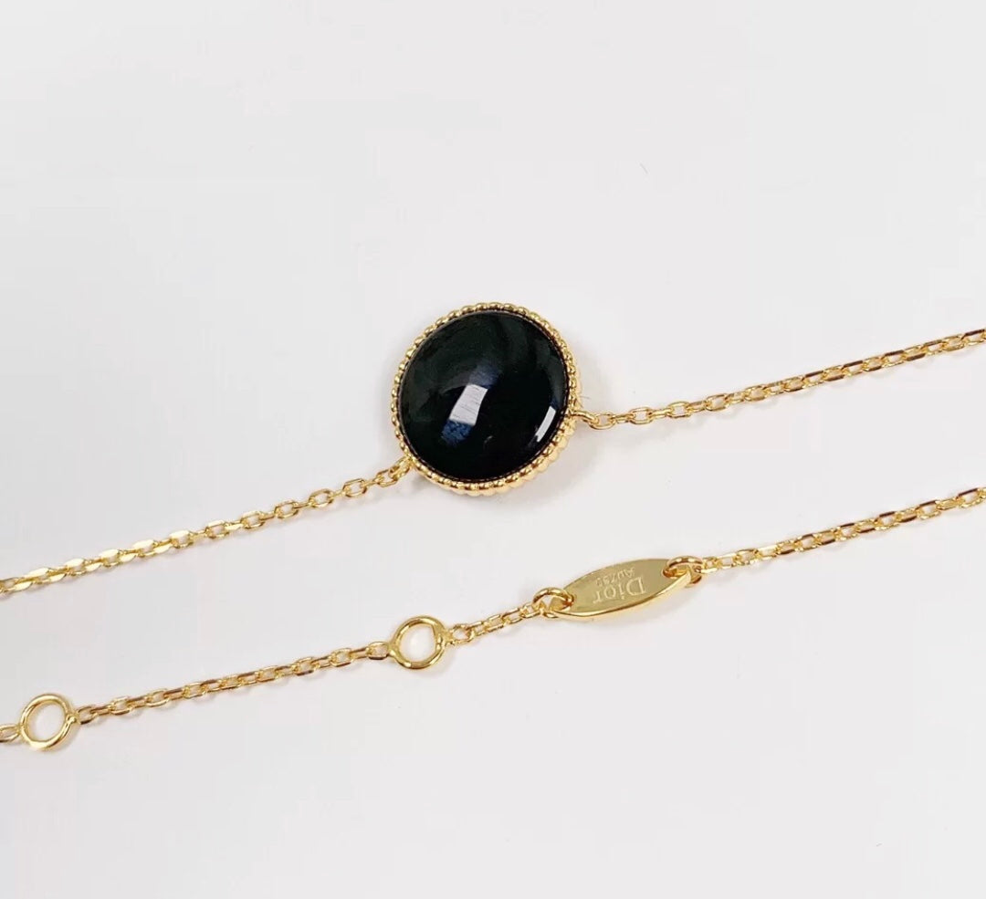 Collier boussole en onyx noir naturel CD Victoire