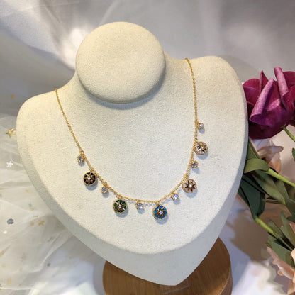 COLLIER ROSE DES VENTS EN OR JAUNE