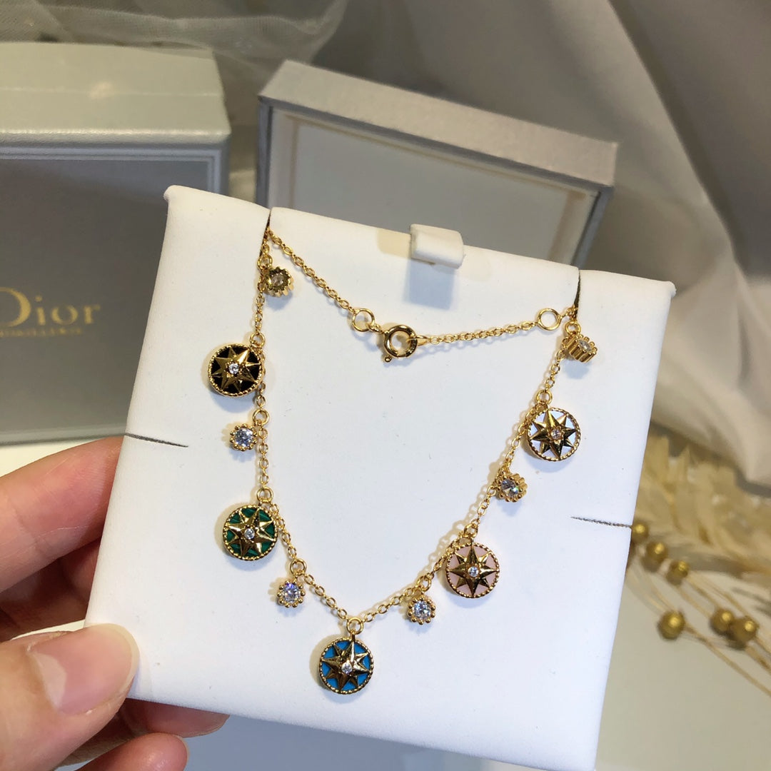 COLLIER ROSE DES VENTS EN OR JAUNE