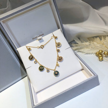 COLLIER ROSE DES VENTS EN OR JAUNE