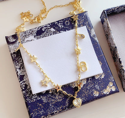COLLIER CD STAR LOVE AVEC LE MÊME MATÉRIAU