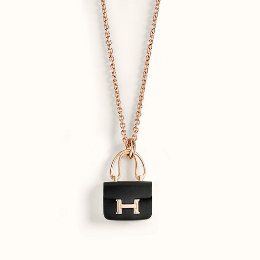 CONSTANCE BLACK PEDANT PINK GOLD NECKLACE