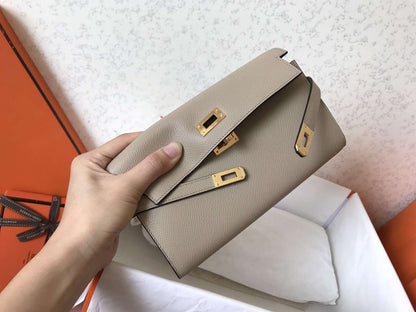 Portefeuille long Kelly 20 cm en cuir Epsom gris