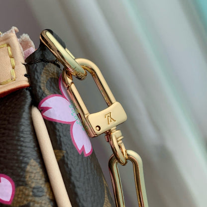 Pochette Accessoires LV x TM 22 cm en toile monogrammée Sakura marron cerisier en fleurs